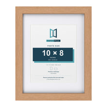 Classic Oak 14 x 11 inch picture frame with a white mount for a 10 x 8 inch photo