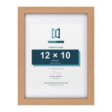 Classic Oak 16 x 12 inch picture frame with a white mount for a 12 x 10 inch photo