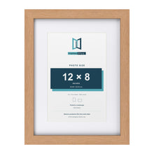 Classic Oak 16 x 12 inch picture frame with a white mount for a 12 x 8 inch photo