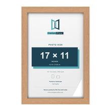 Classic Oak 18 x 12 inch picture frame with a white mount for a 17 x 11 inch photo