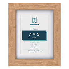 Classic Oak 9 x 7 inch picture frame with a white mount for a 7 x 5 inch photo