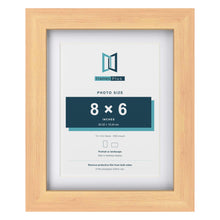 Classic Pine 10 x 8 inch picture frame with a white mount for an 8 x 6 inch photo