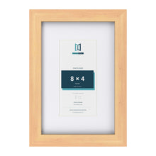 Classic Pine 12 x 8 inch picture frame with a white mount for an 8 x 4 inch photo