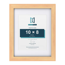Classic Pine 14 x 11 inch picture frame with a white mount for a 10 x 8 inch photo
