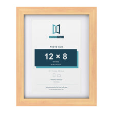Classic Pine 14 x 11 inch picture frame with a white mount for a 12 x 8 inch photo