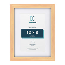 Classic Pine 16 x 12 inch picture frame with a white mount for a 12 x 8 inch photo