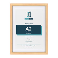 Classic Pine 70 x 50 cm picture frame with a white mount for an A2 photo