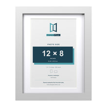 Classic White 14 x 11 inch picture frame with a white mount for a 12 x 8 inch photo
