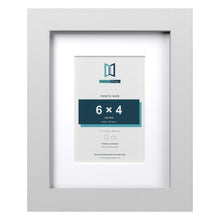 Classic White 9 x 7 inch picture frame with a white mount for a 6 x 4 inch photo