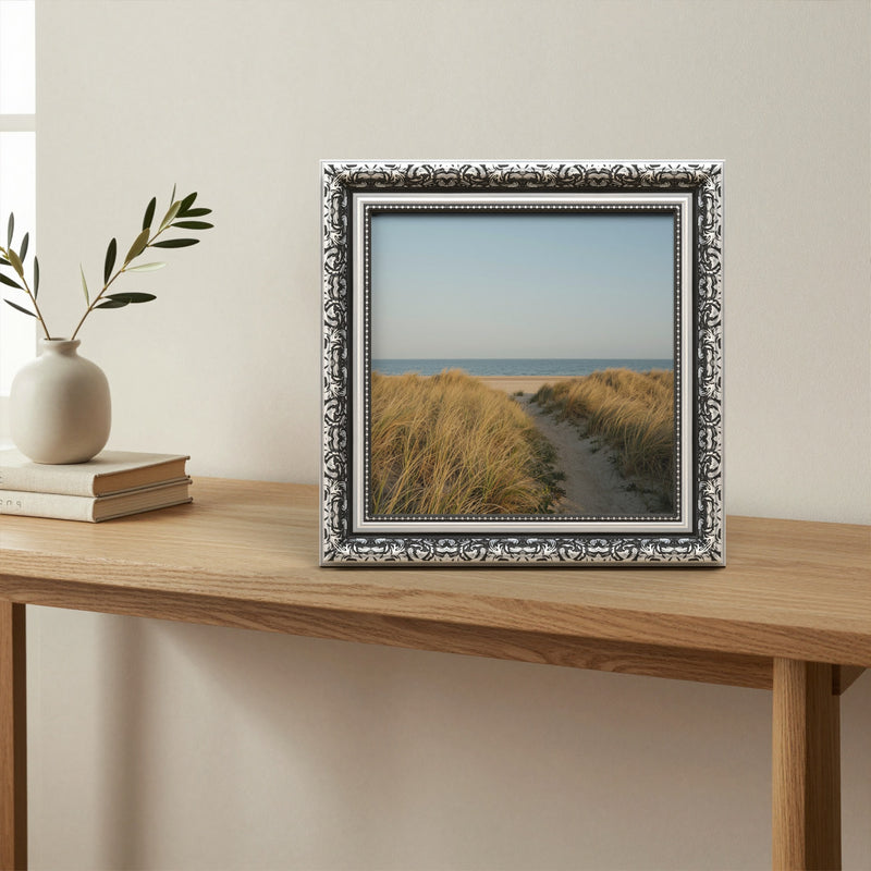 Dahlia Silver picture frame, standing on a table