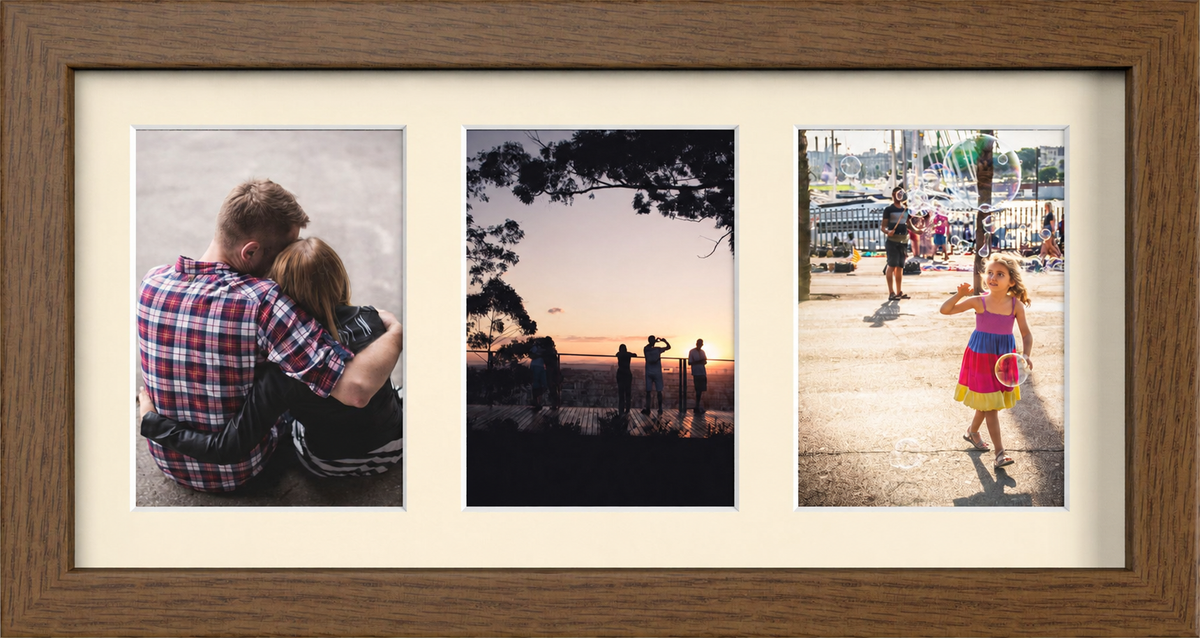 Dark Brown Multi-Aperture Frame for 3 Photos 7x5" with Ivory Mount displaying photographs
