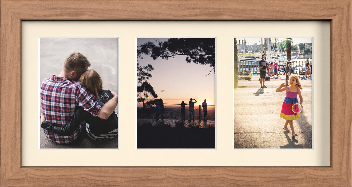 Dark Oak Multi-Aperture Frame for 3 Photos 7x5" with Ivory Mount displaying photographs
