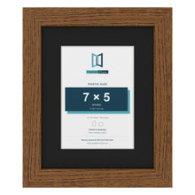 Dark Oak 10 x 8 inch picture frame with a black mount for a 7 x 5 inch photo
