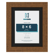 Dark Oak 10 x 8 inch picture frame with a black mount for an 8 x 6 inch photo