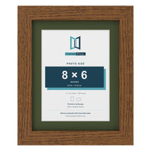 Dark Oak 10 x 8 inch picture frame with a green mount for an 8 x 6 inch photo