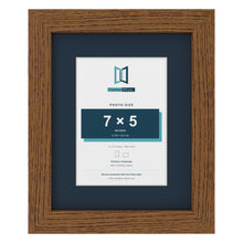 Dark Oak 10 x 8 inch picture frame with a Pacific Blue mount for a 7 x 5 inch photo