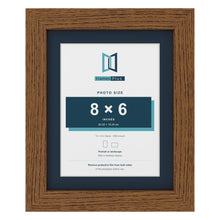 Dark Oak 10 x 8 inch picture frame with a Pacific Blue mount for an 8 x 6 inch photo