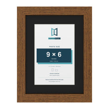 Dark Oak 12 x 9 inch picture frame with a black mount for a 9 x 6 inch photo