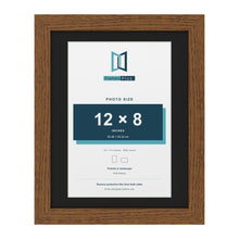 Dark Oak 14 x 11 inch picture frame with a black mount for a 12 x 8 inch photo