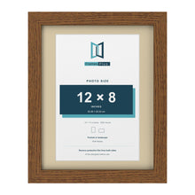 Dark Oak 14 x 11 inch picture frame with an ivory mount for a 12 x 8 inch photo