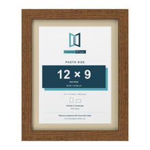 Dark Oak 14 x 11 inch picture frame with an ivory mount for a 12 x 9 inch photo