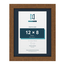 Dark Oak 14 x 11 inch picture frame with a Pacific Blue mount for a 12 x 8 inch photo