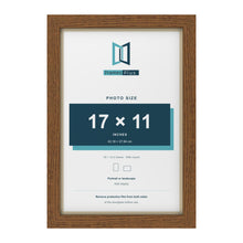 Dark Oak 18 x 12 inch picture frame with an ivory mount for a 17 x 11 inch photo