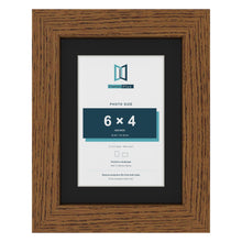 Dark Oak 8 x 6 inch picture frame with a black mount for a 6 x 4 inch photo