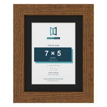 Dark Oak 9 x 7 inch picture frame with a black mount for a 7 x 5 inch photo