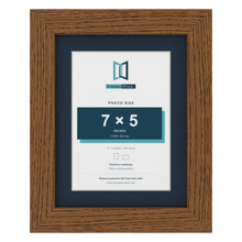 Dark Oak 9 x 7 inch picture frame with a Pacific Blue mount for a 7 x 5 inch photo