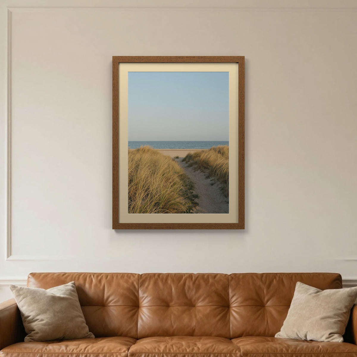 Dark Oak picture frame with an ivory mount hanging on a living room wall