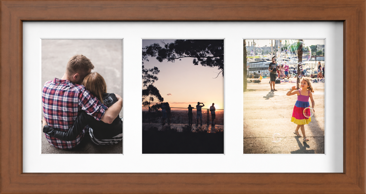 Dark Teak Multi-Aperture Frame for 3 Photos 7x5" with White Mount displaying photographs