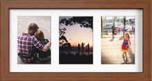 Dark Teak Multi-Aperture Frame for 3 Photos 7x5" with White Mount displaying photographs