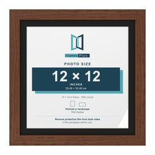 Dark Teak 14 x 14 inch picture frame with a black mount for a 12 x 12 inch photo