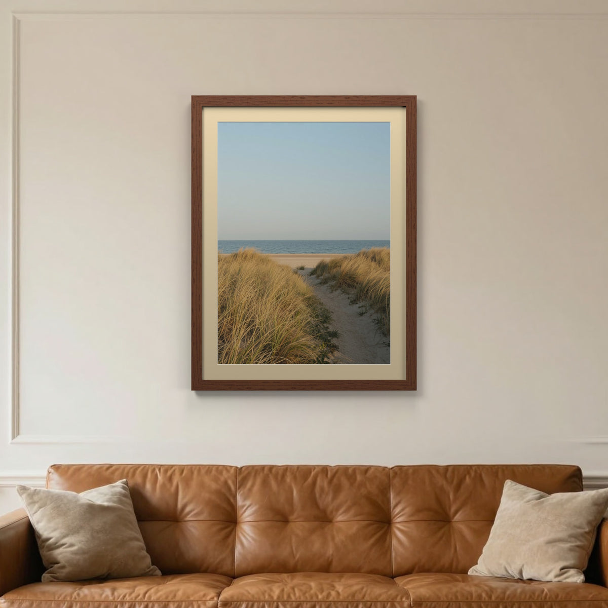 Dark Teak picture frame with an ivory mount hanging on a living room wall
