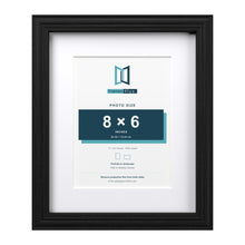 Devon Black 11 x 9 inch picture frame with a white mount for an 8 x 6 inch photo