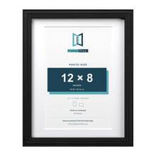 Devon Black 14 x 11 inch picture frame with a white mount for a 12 x 8 inch photo