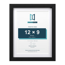 Devon Black 14 x 11 inch picture frame with a white mount for a 12 x 9 inch photo