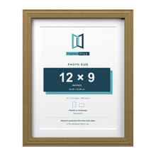 Devon Gold 14 x 11 inch picture frame with a white mount for a 12 x 9 inch photo