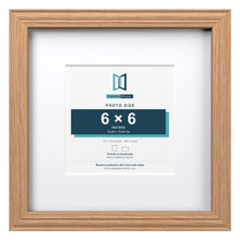Devon Oak 10 x 10 inch picture frame with a white mount for a 6 x 6 inch photo