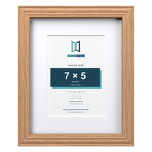 Devon Oak 10 x 8 inch picture frame with a white mount for a 7 x 5 inch photo