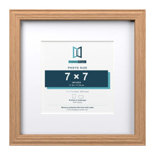Devon Oak 11 x 11 inch picture frame with a white mount for a 7 x 7 inch photo