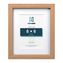 Devon Oak 11 x 9 inch picture frame with a white mount for an 8 x 6 inch photo