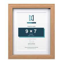 Devon Oak 11 x 9 inch picture frame with a white mount for a 9 x 7 inch photo