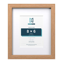 Devon Oak 12 x 10 inch picture frame with a white mount for an 8 x 6 inch photo