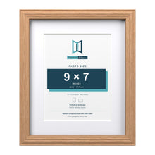 Devon Oak 12 x 10 inch picture frame with a white mount for a 9 x 7 inch photo
