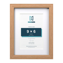Devon Oak 12 x 9 inch picture frame with a white mount for a 9 x 6 inch photo