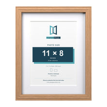 Devon Oak 14 x 11 inch picture frame with a white mount for an 11 x 8 inch photo