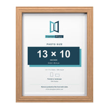 Devon Oak 14 x 11 inch picture frame with a white mount for a 13 x 10 inch photo