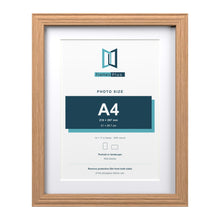 Devon Oak 14 x 11 inch picture frame with a white mount for an A4 photo